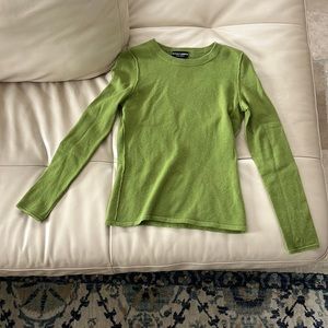 Green cashmere sweater.